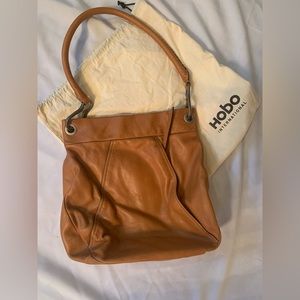 Hobo brown purse brand new with storage bag